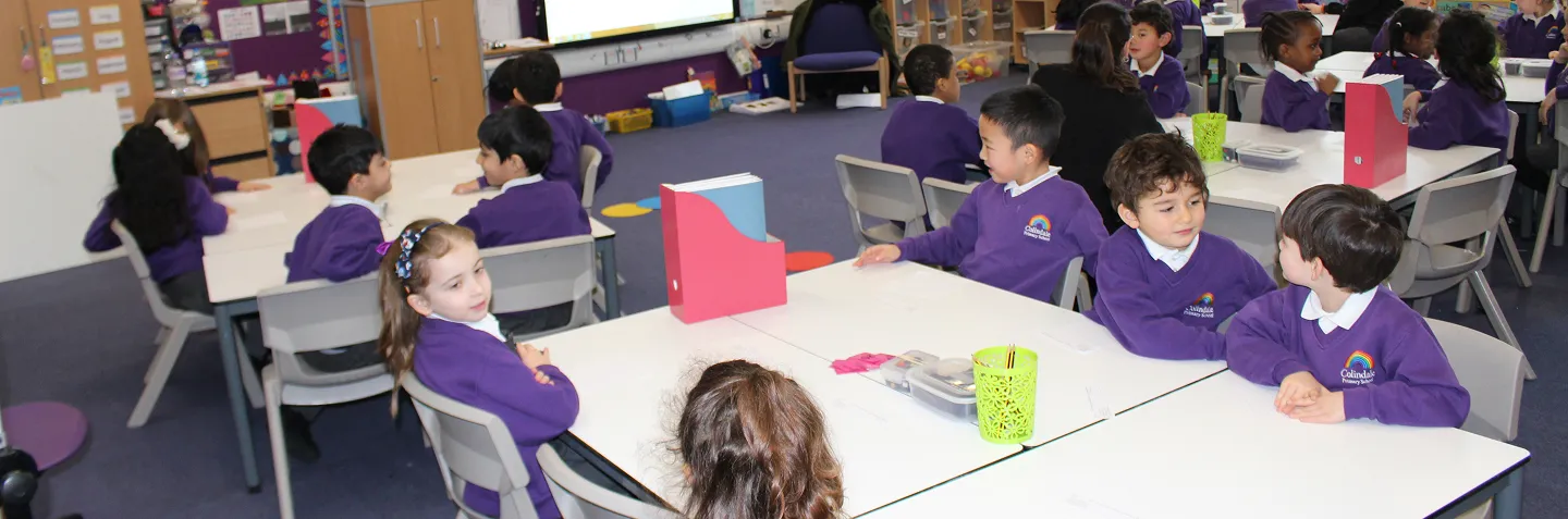 Colindale Primary School pupils in a bright classroom during a lesson